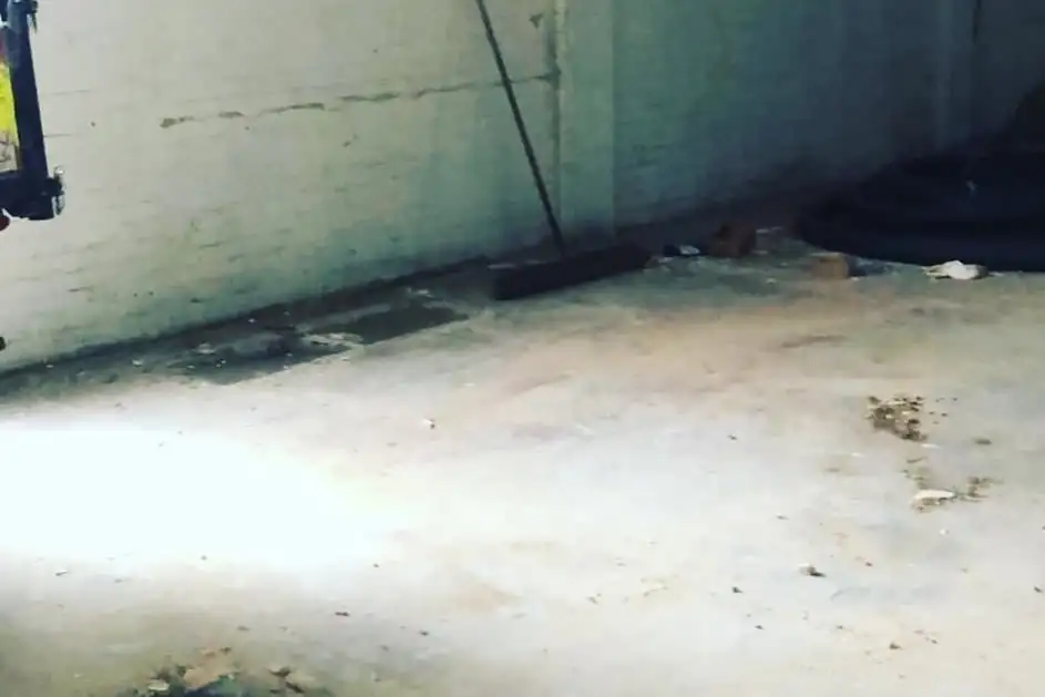After: The concrete floor of the industrial unit cleared and swept